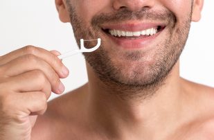 Here’s All You Need To Know About Flossing-Cover Image